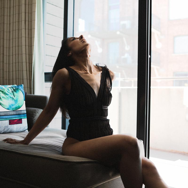 boudoir photo of woman in black lingerie